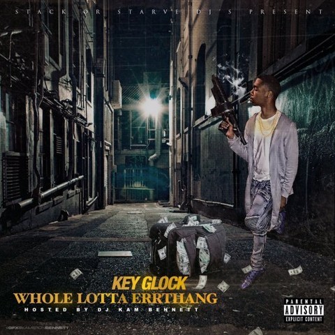 The cover of Key Glock's Whole Lotta Errthang with KG standing with a gun and a bag of money in an empty city