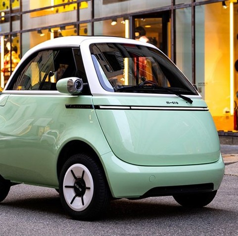 Green "bubble shaped" EV has its door in the front like the classic Italian Isetta 