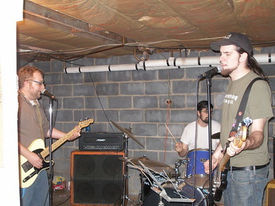 The Retro Delicatessen, one of my old bands. Jesse Davis on the left on guitar, Joe Rankin on drums, me singing on bass. 