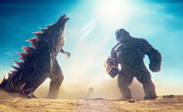 Godzilla and Kong yelling together in the desert