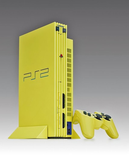 Another shot of the light yellow, the rarest console and controller of the Automobile Color Collection Sony released in 2001 to commemorate the sale of the 20 millionth PS2 console sold worldwide.