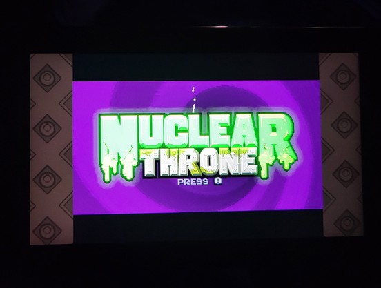 The logo for Nuclear Throne on Switch. Nuclear in green letters, Throne in yellow. 