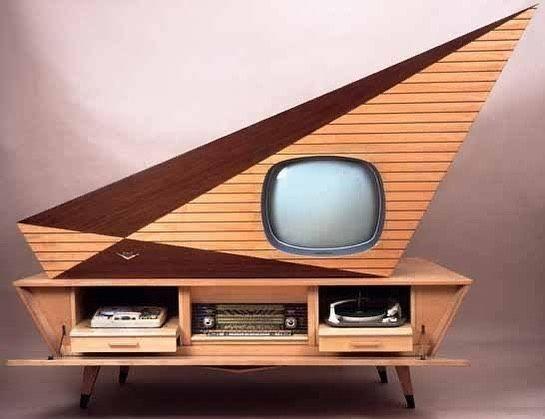 The Kuba Komet entertainment center from 1957. Wild, futuristic design, a TV on the left side of the triangular top section, and a record player and radio below