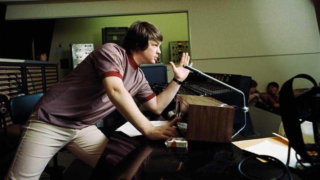 A photo of Brian Wilson in the studio, color