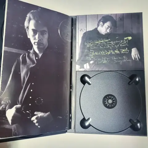 The back inside cover of Neil's 'In My Lifetime' box set with a cool early pic of Neil and some text but the CD is missing 😢