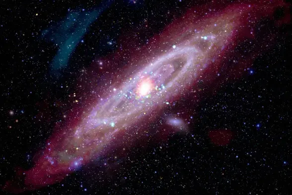 Andromeda Galaxy in a composite image including X-rays from Chandra and XMM-Newton, ultraviolet data from GALEX, optical data from astrophotographers using ground-based telescopes, infrared data from Spitzer, IRAS, COBE, Planck and Herschel, and radio data from the Westerbork Synthesis Radio Telescope. Credit: X-ray: NASA/CXO/UMass/Z. Li & Q.D. Wang, ESA/XMM-Newton; Infrared: NASA/JPL-Caltech/WISE, Spitzer, NASA/JPL-Caltech/K. Gordon (U. Az), ESA/Herschel, ESA/Planck, NASA/IRAS, NASA/COBE; Radi…