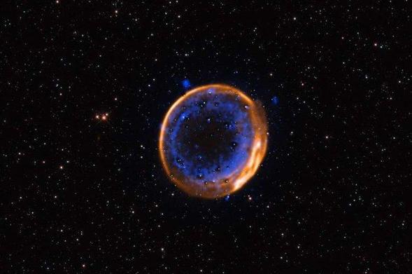 This image, taken with ESO's Very Large Telescope (VLT), shows the supernova remnant SNR 0509-67.5. These are the expanding remains of a star that exploded hundreds of years ago in a double-detonation – the first photographic evidence that stars can die with two blasts. The data were captured with the Multi-Unit Spectroscopic Explorer (MUSE) instrument at the VLT. MUSE allows astronomers to map the distribution of different chemical elements, displayed here in different colors. Calcium is shown…